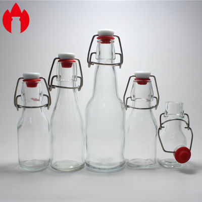 Spezifische, klare Glasflasche mit Form für Soda, Saft, Wein, Bier, Getränke
